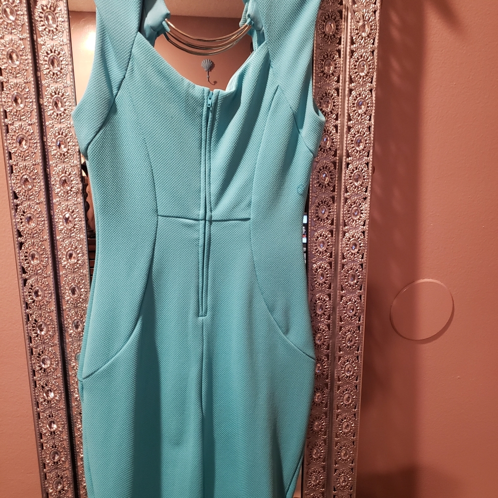 Turquoise color dress. Very flattering